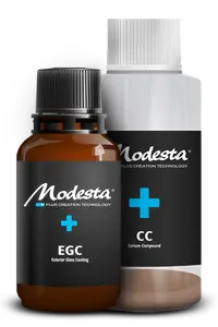 Bottle of Modesta ceramic coating with its label clearly visible.