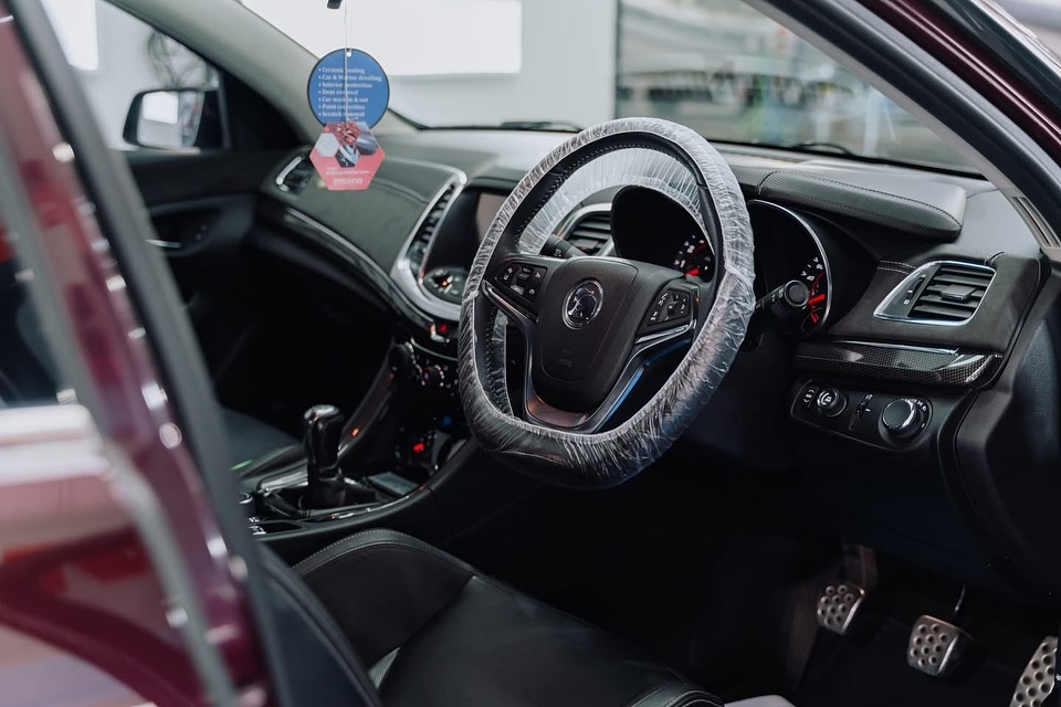 Car interior detailing Melbourne, cleaned dashboard steering wheel and seats